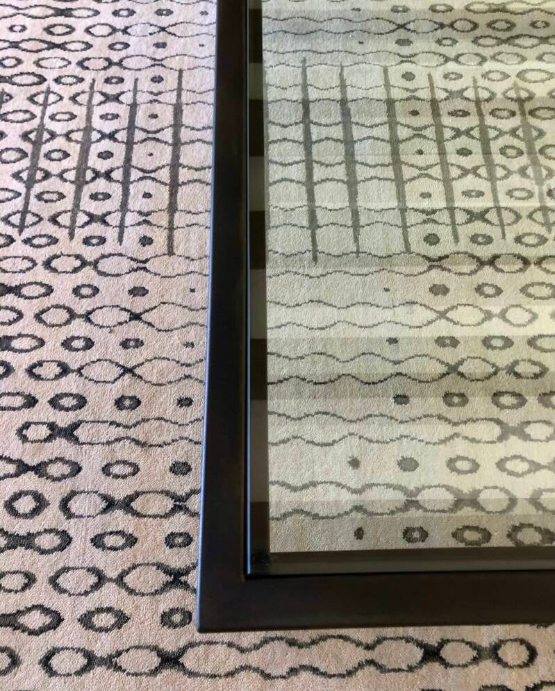 Detail of steel frame with inset glass top panel. Santa Fe Homes
