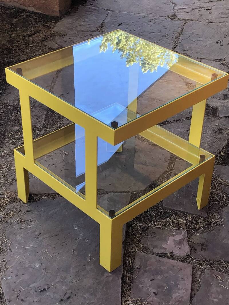 Modern glass shelved side table. NM powder coat