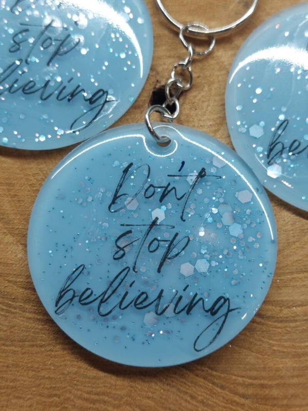 Sleutelhanger 'Don't stop believing' blauw