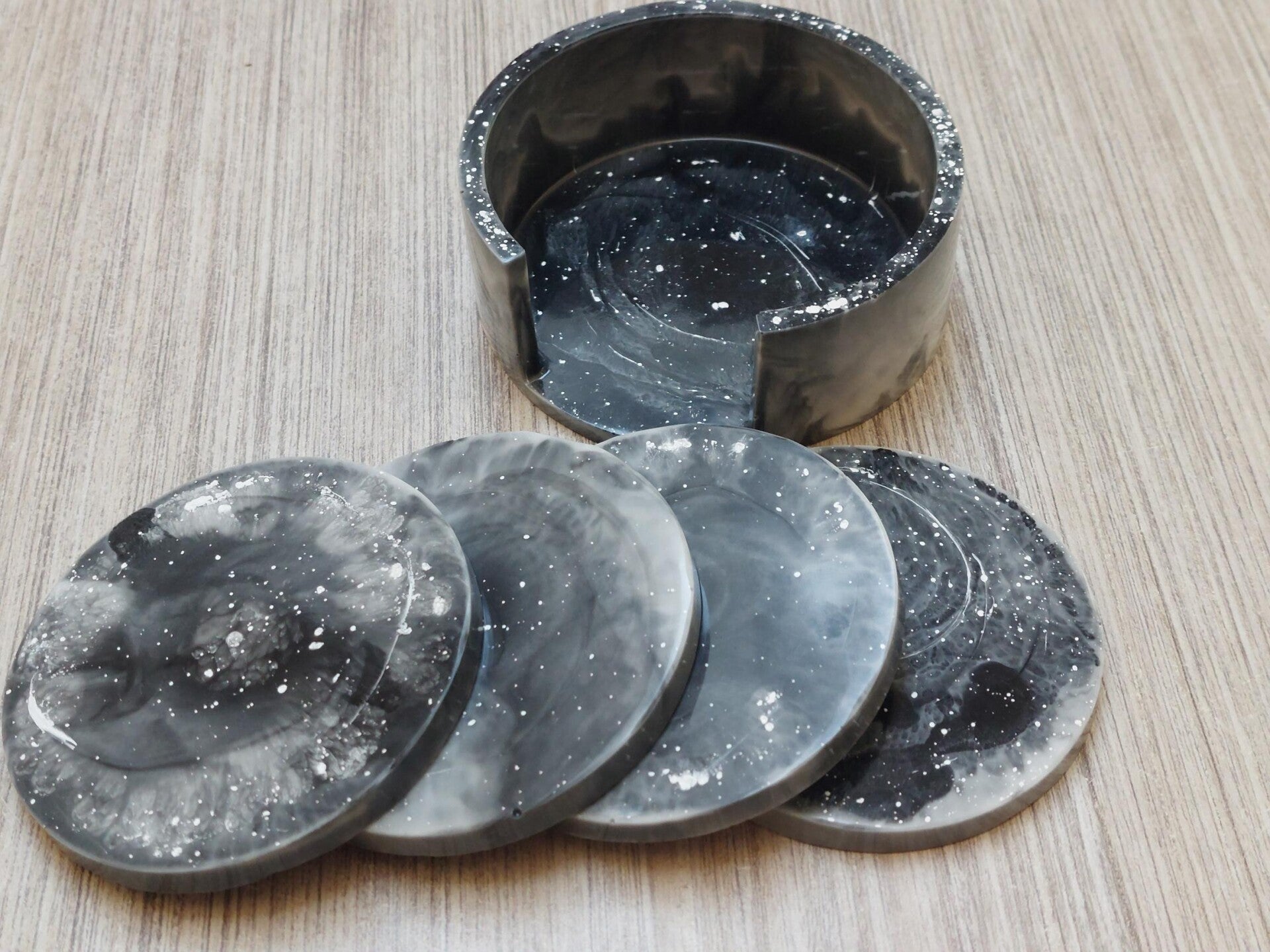 Set van 4 onderzetters met houder Zwart/wit gespikkeld