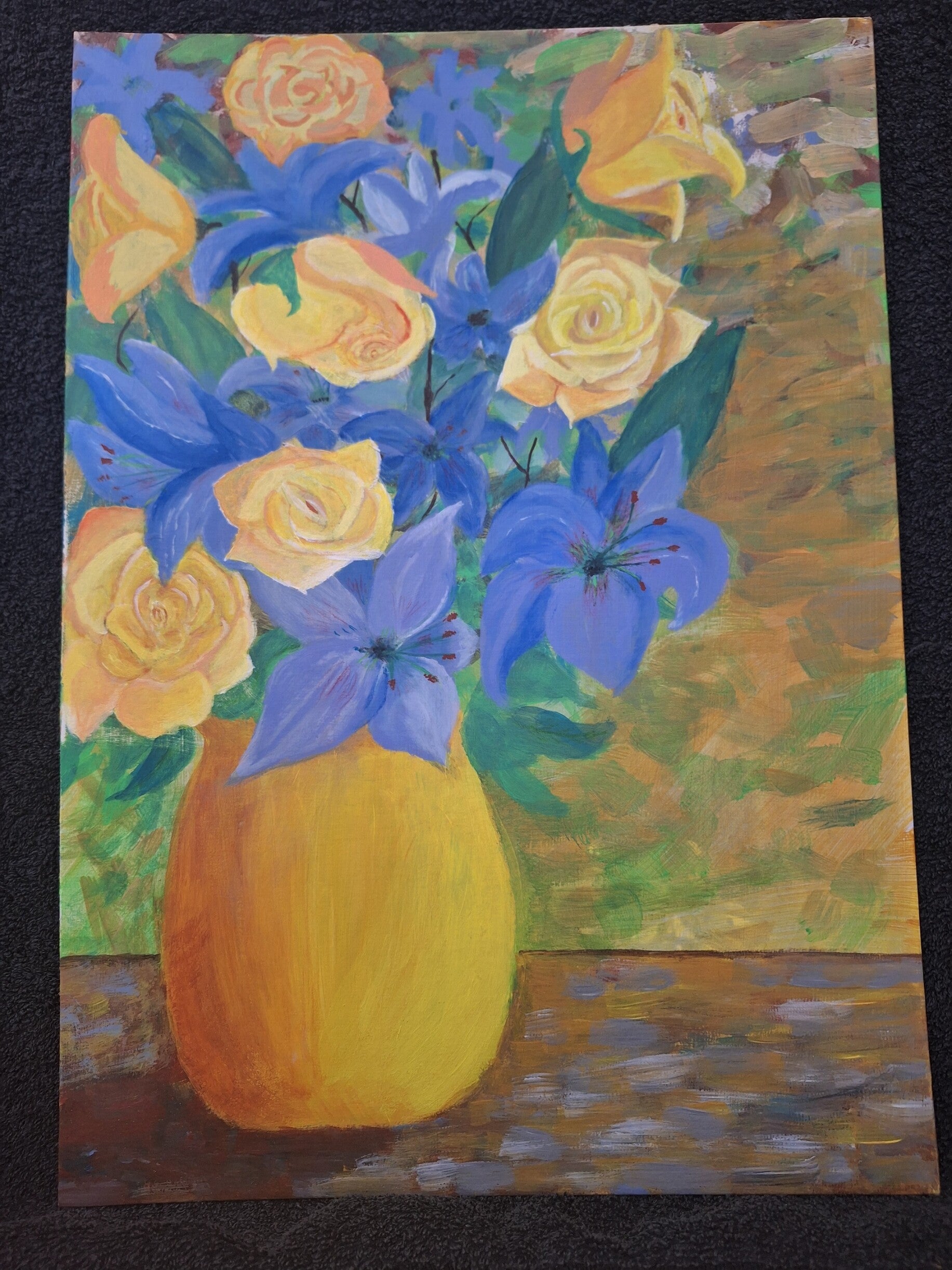 Yellow vase of flowers