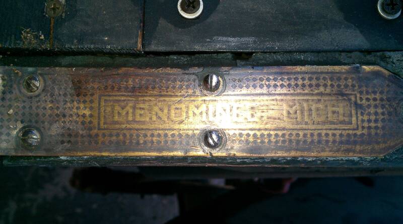 Parte de una placa de umbral de camión Menominee (1915)