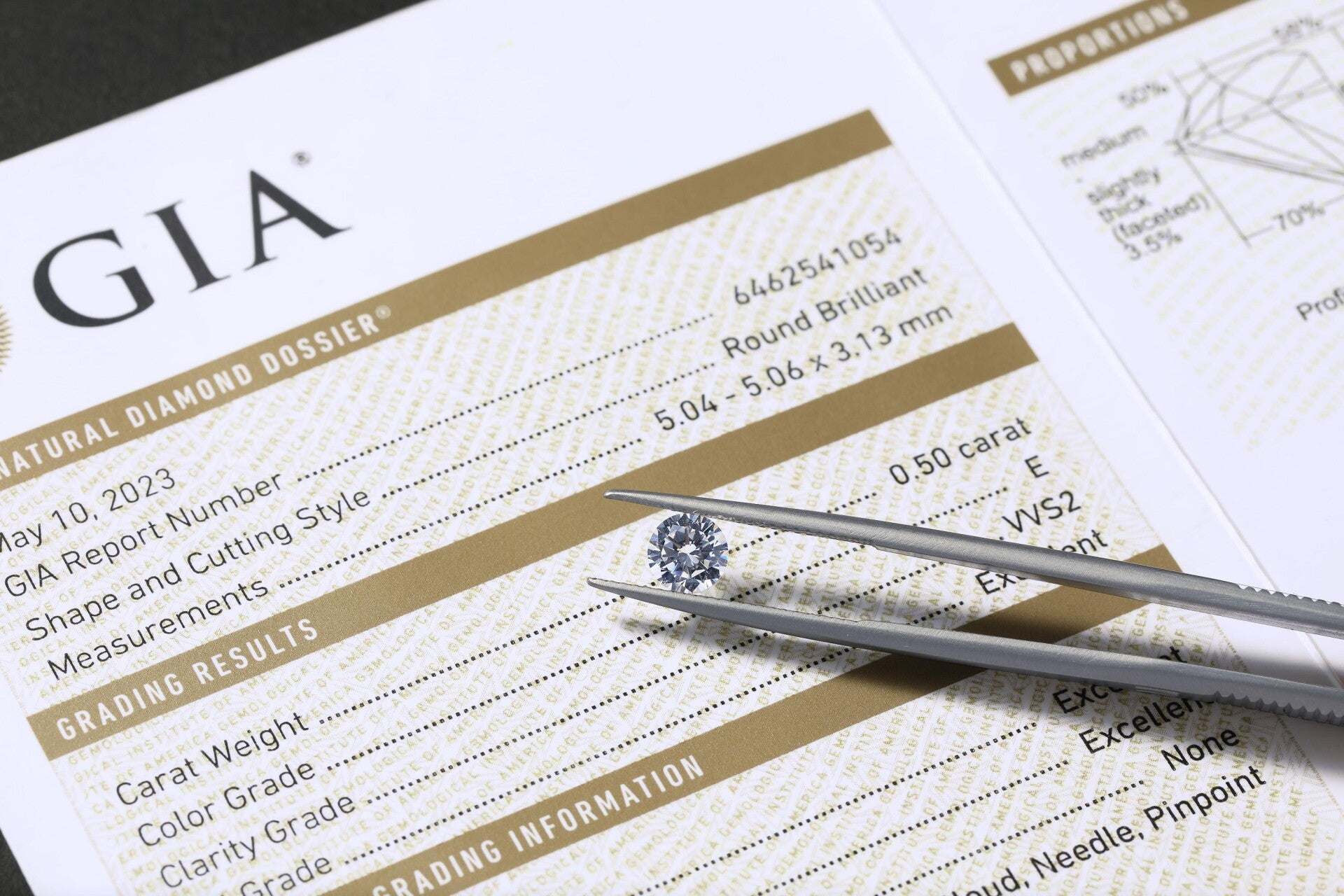 GIA certified diamond being checked for its 4C's by Darren Cotter