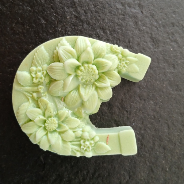 hoefijzer met bloemen