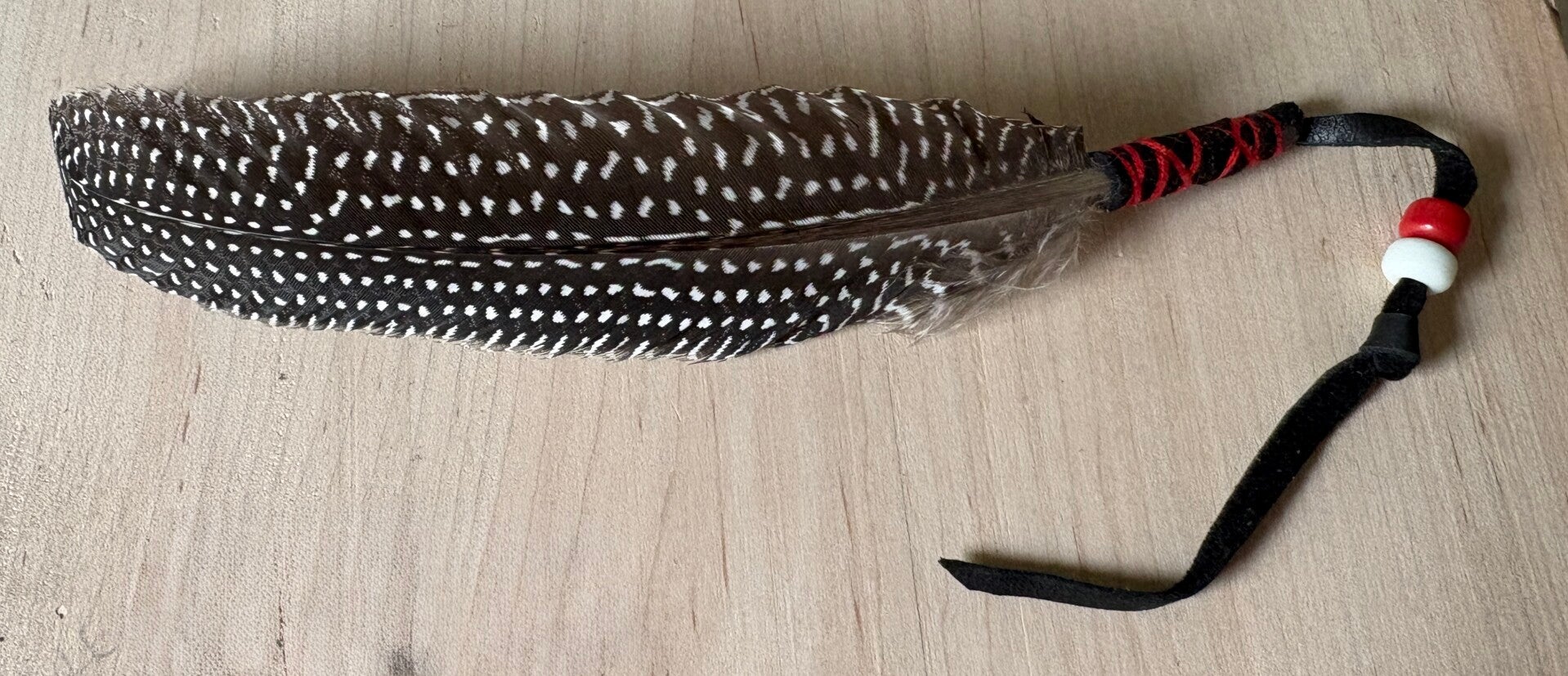 Leather Wrapped Guinea Hen Feather