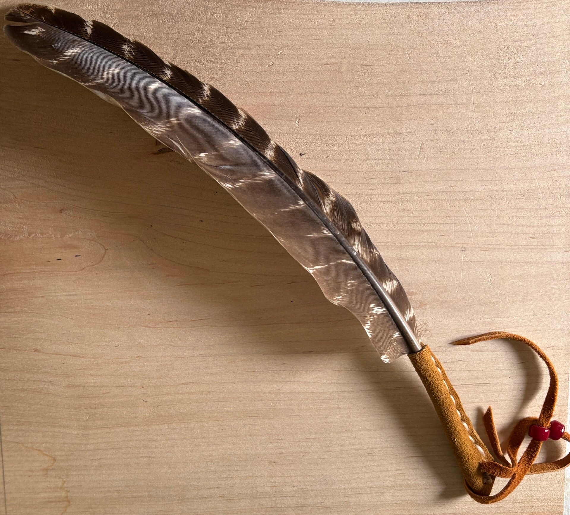 Leather Wrapped Turkey Feather