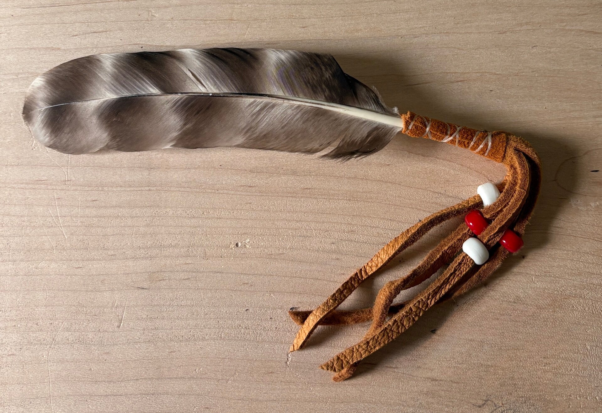 Leather Wrapped Pheasant Feather