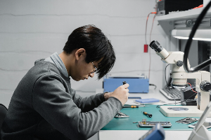 Man servicing a walkie-talkie