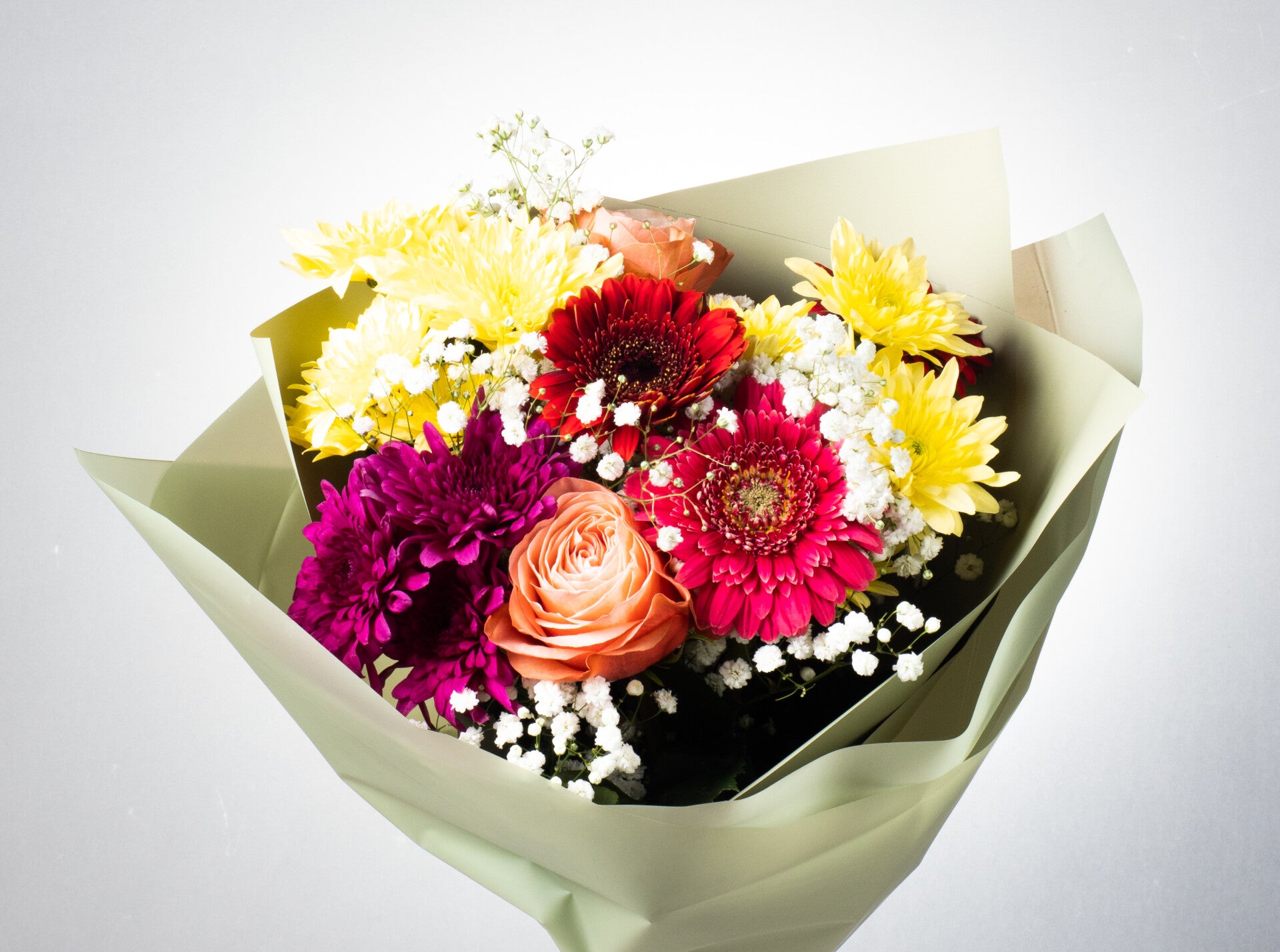 Multicolored seasonal bouquet with seasonal flowers