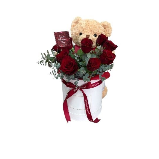 Box with 9 roses, greenery and teddy 50cm