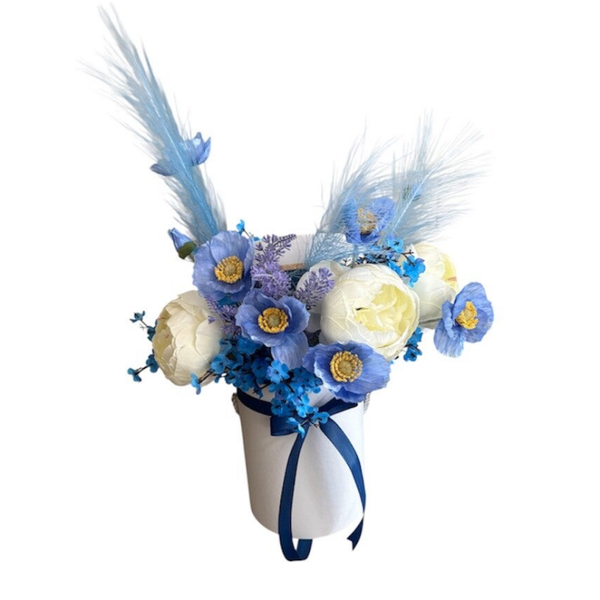 Artificial flowers arrangement in blue colours