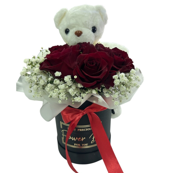 5 Red roses and greenery in a box with a teddy bear