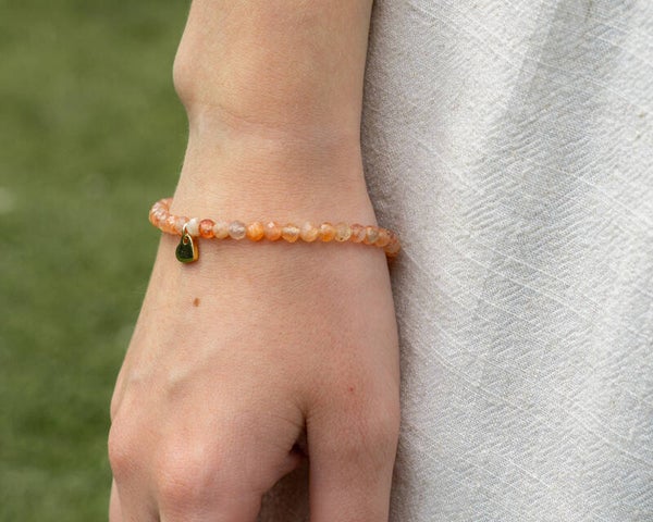 Koraal armbandje met hartje