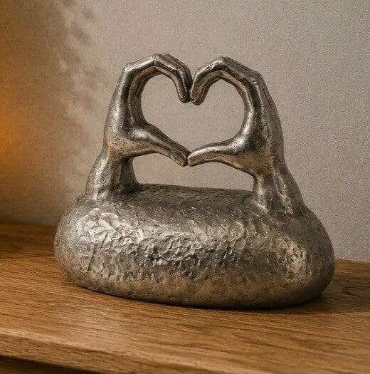 Urn handen in hart