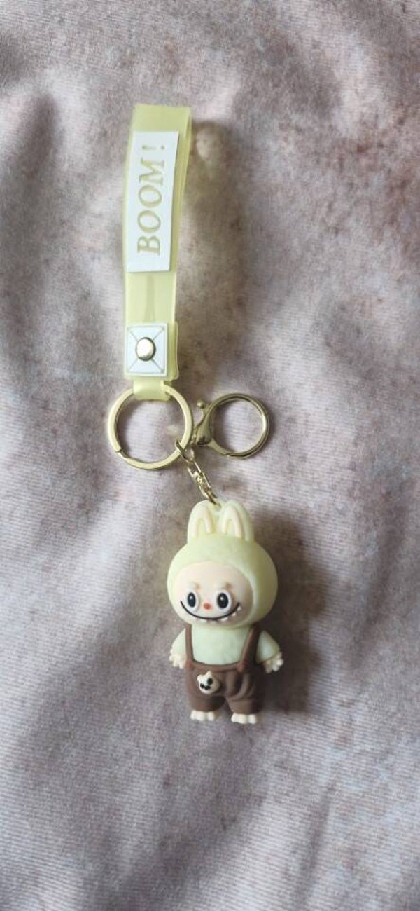 Sleutelhanger Lafufu geel/bruin