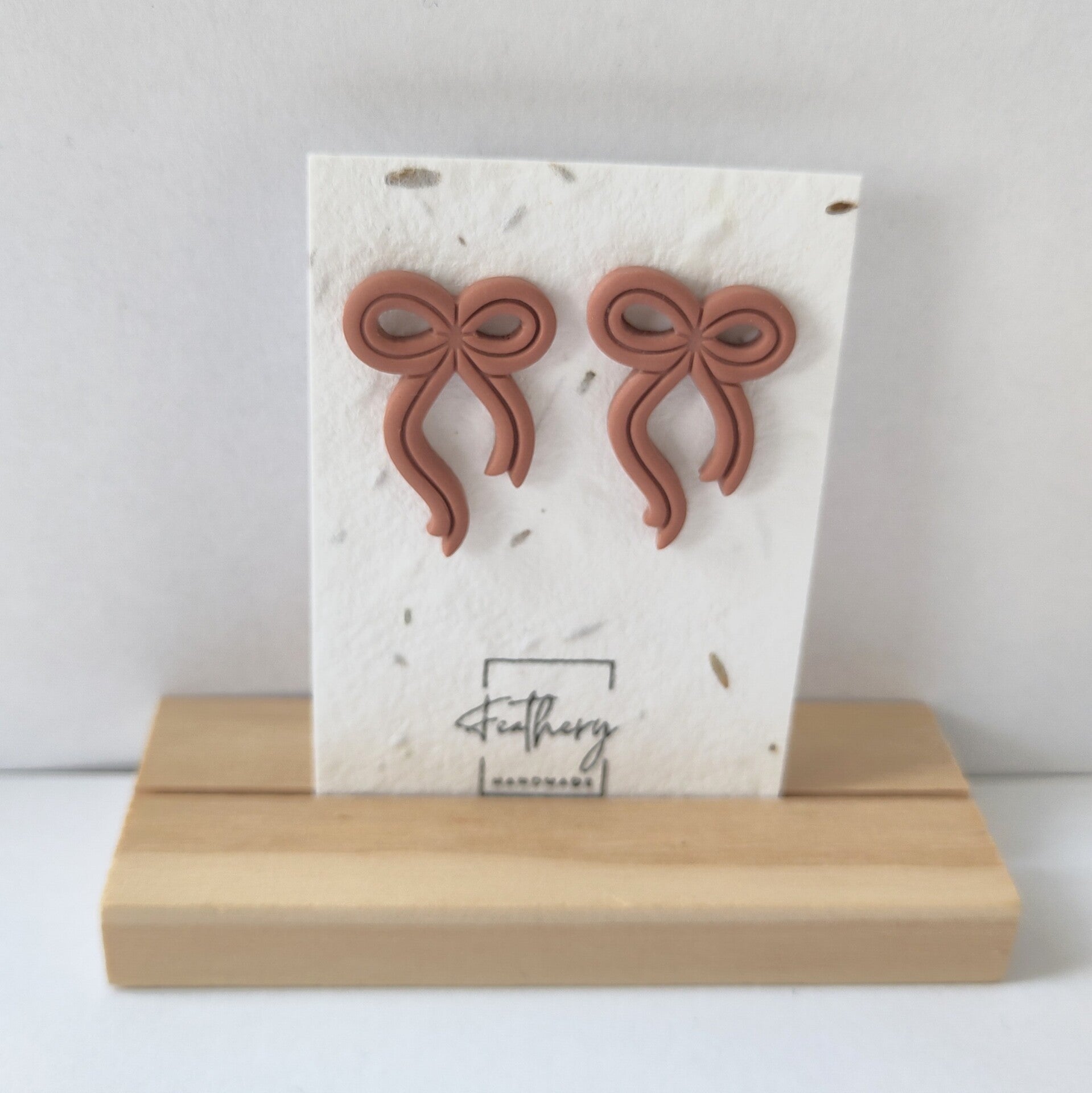 Strikjes groot studs - dust pink