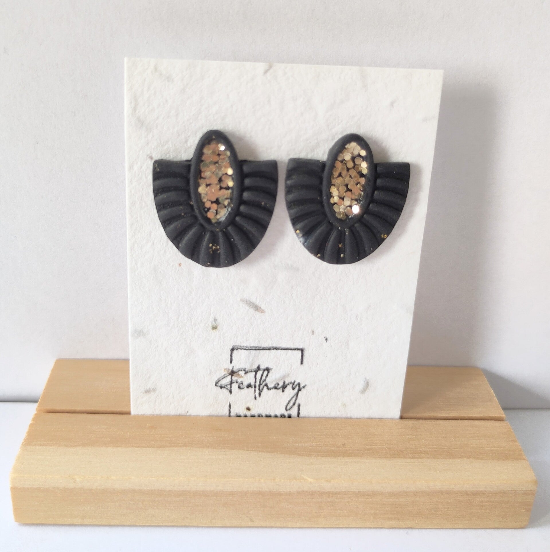 Chique stud - zwart & goud