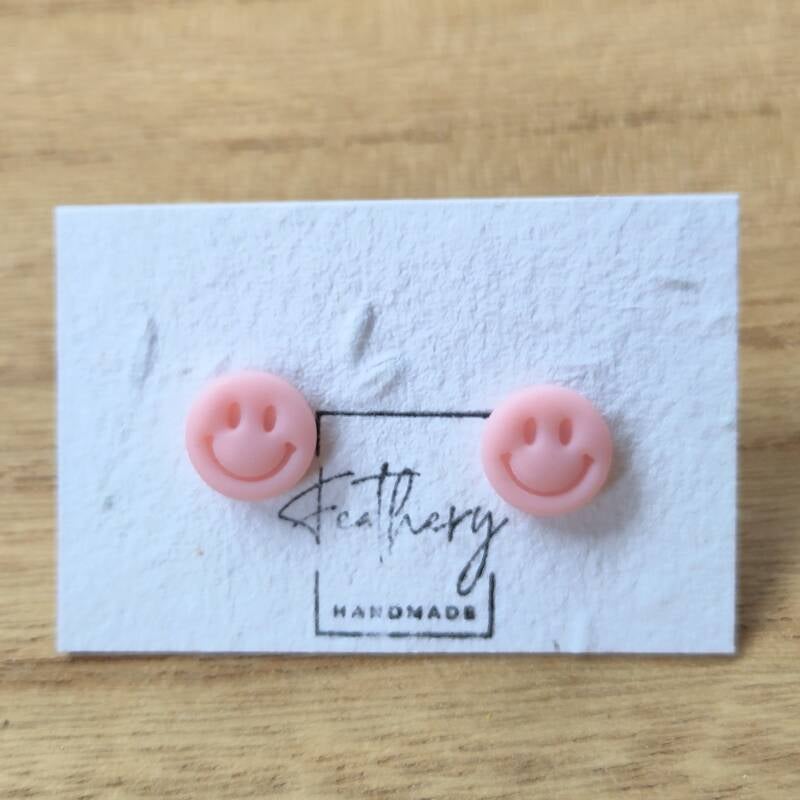 Smiley studs - licht roze