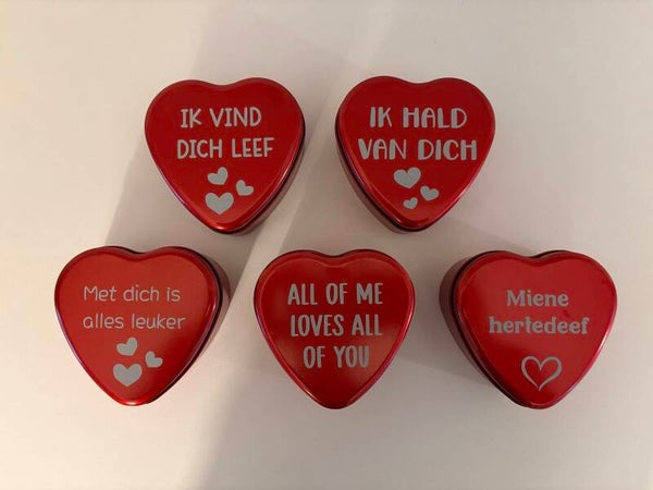 Hartvormig blikje met tekst