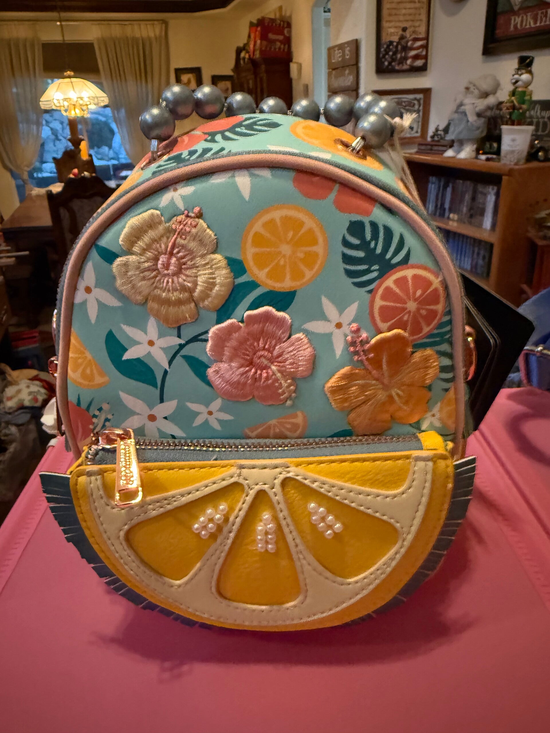 Loungefly Tropical Lemon Floral Convertible Mini Backpack & Crossbody Bag.