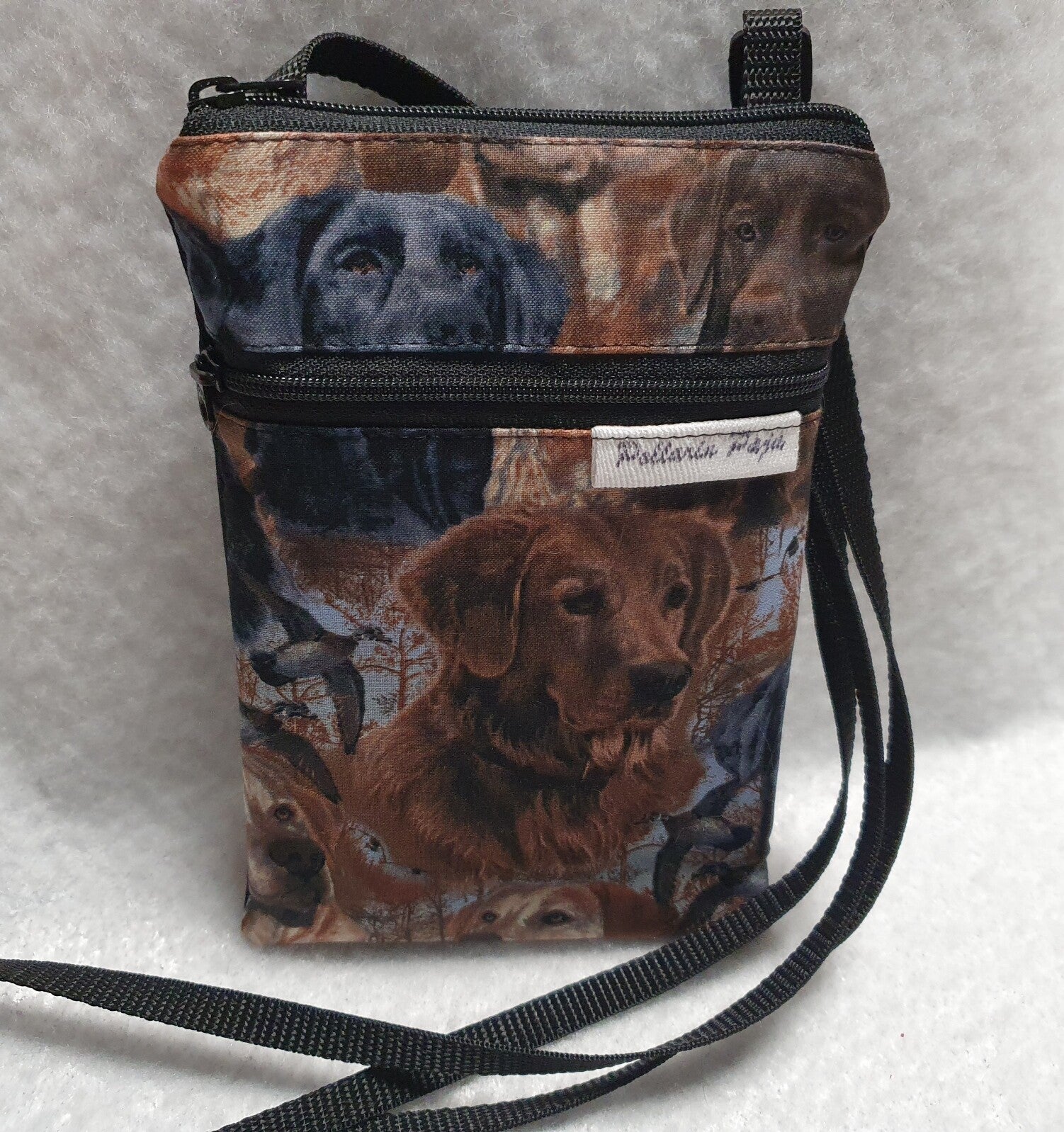 Kännykkälaukku noutajat