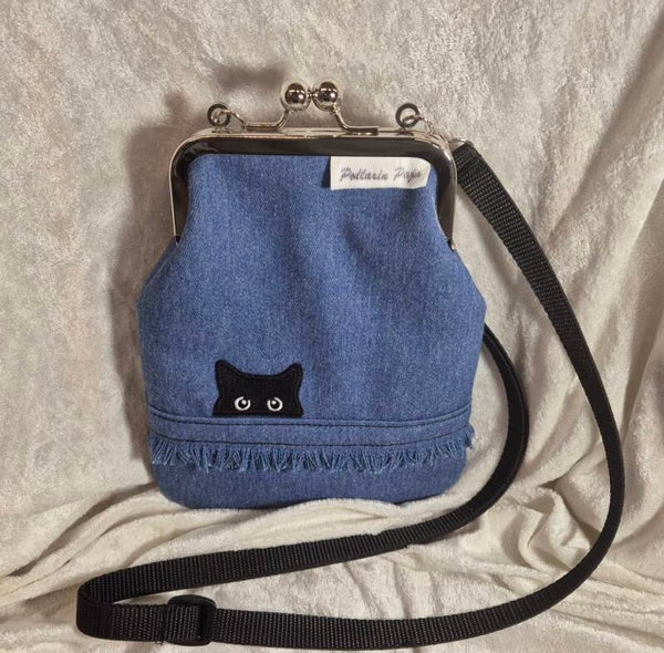 Kukkarolaukku 12 kurkistava katti