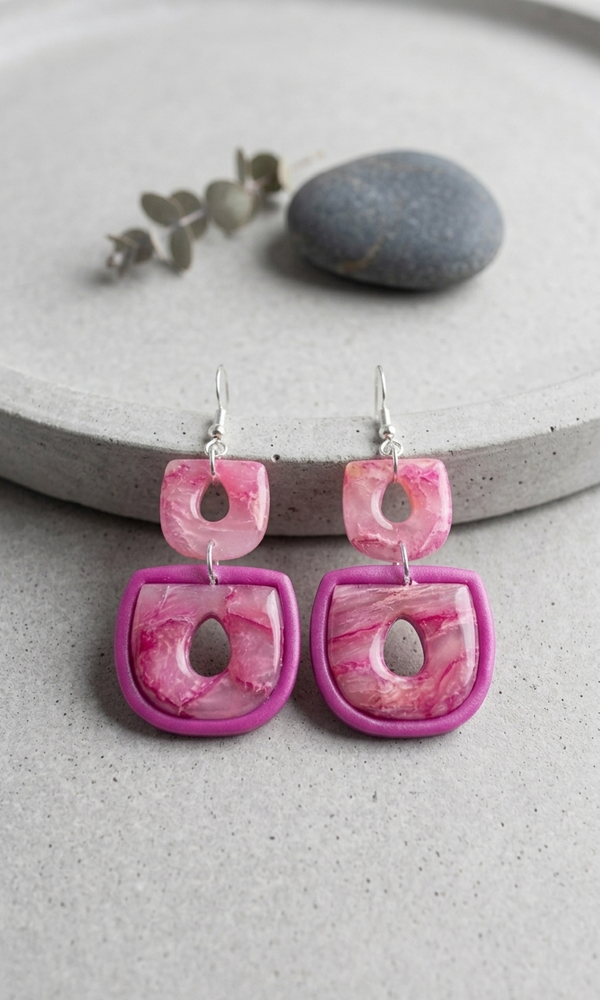 Statement oorbellen roze