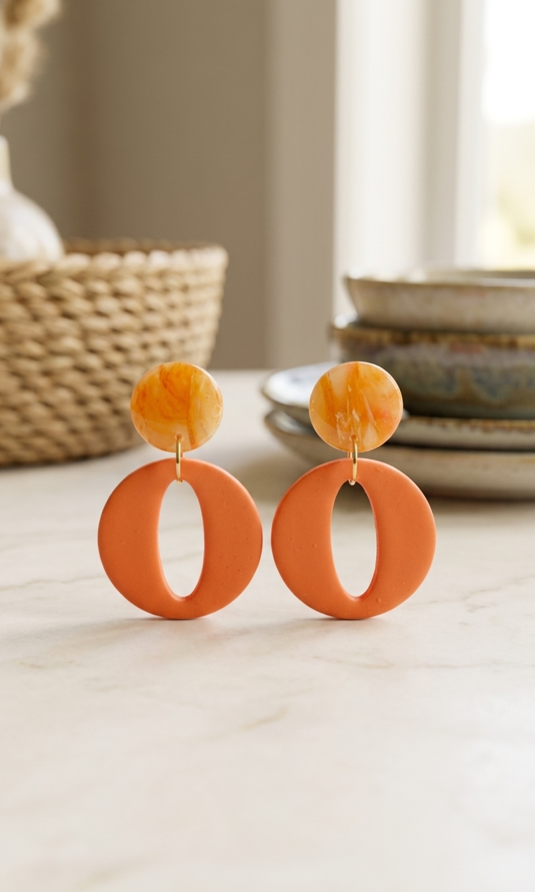 Statement oorbellen oranje marmer