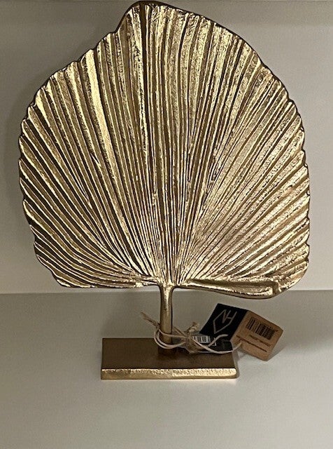 house vitamin blad op voet goud