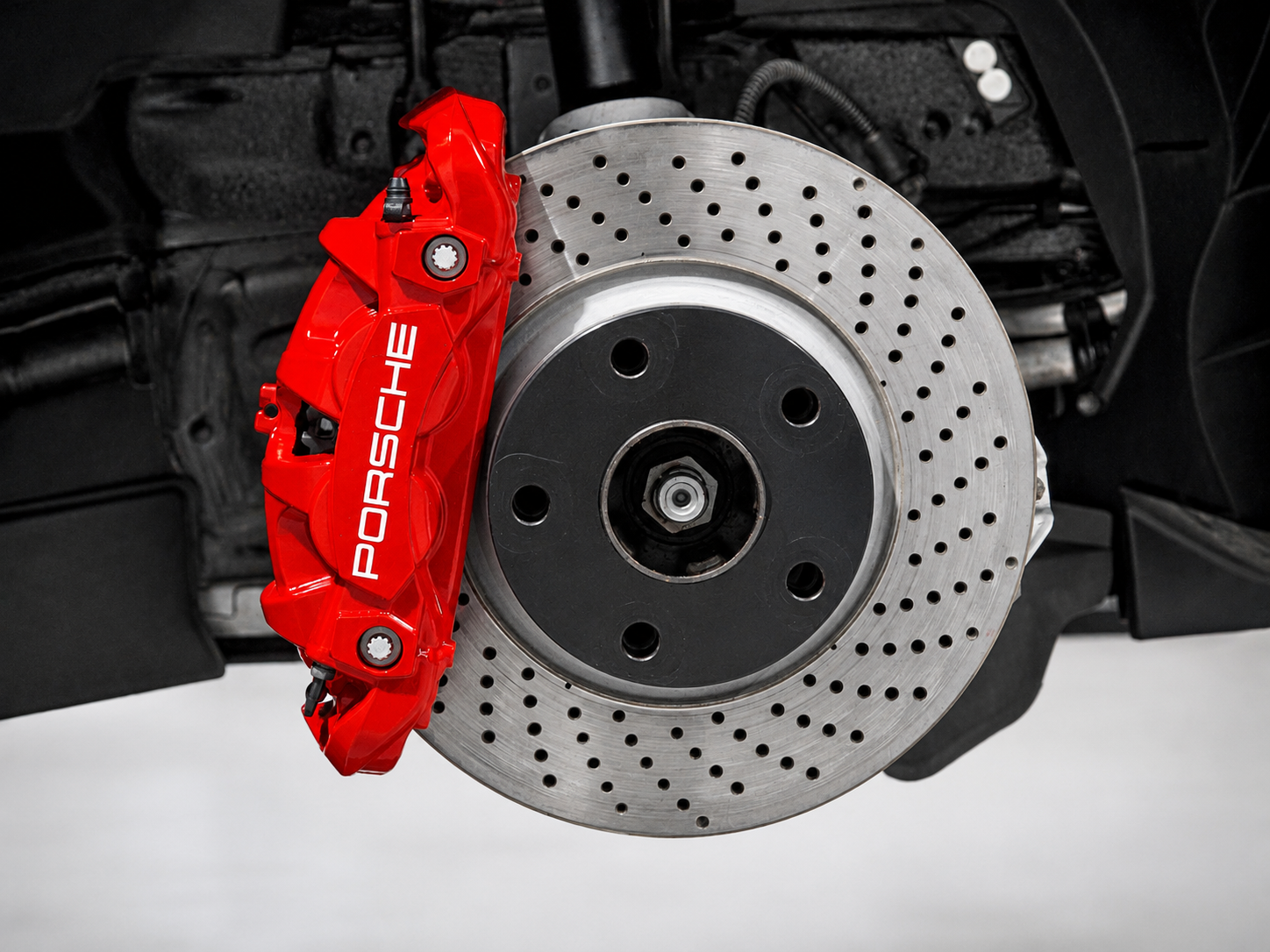 Porsche remklauwen rood spuiten