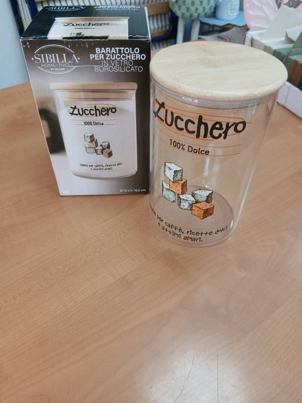 Barattolo in vetro con coperchio in legno per lo zucchero