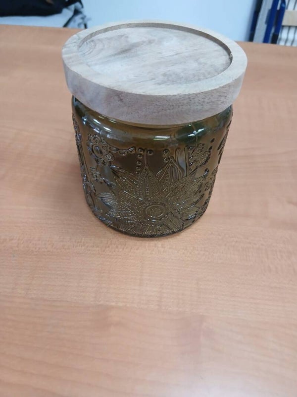 Barattolo in vetro verde con coperchio