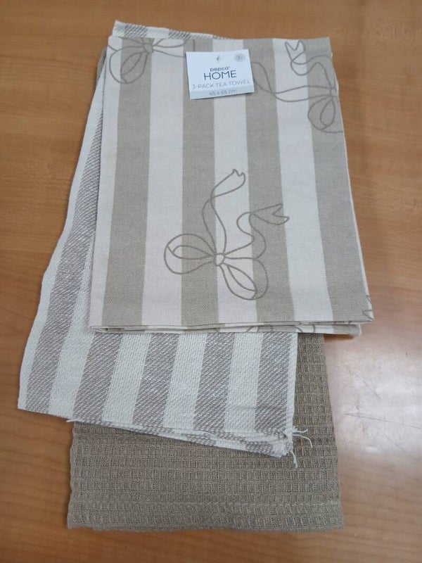 Set tre strofinacci con fiocchi e righe