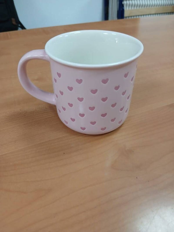 Tazza rosa con cuori
