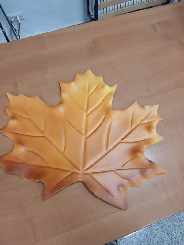 Tovaglietta in plastica a forma di foglia