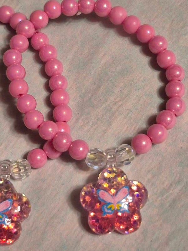 PINK BEADED BRACELET WITH FLOWER & BUTTERFLY