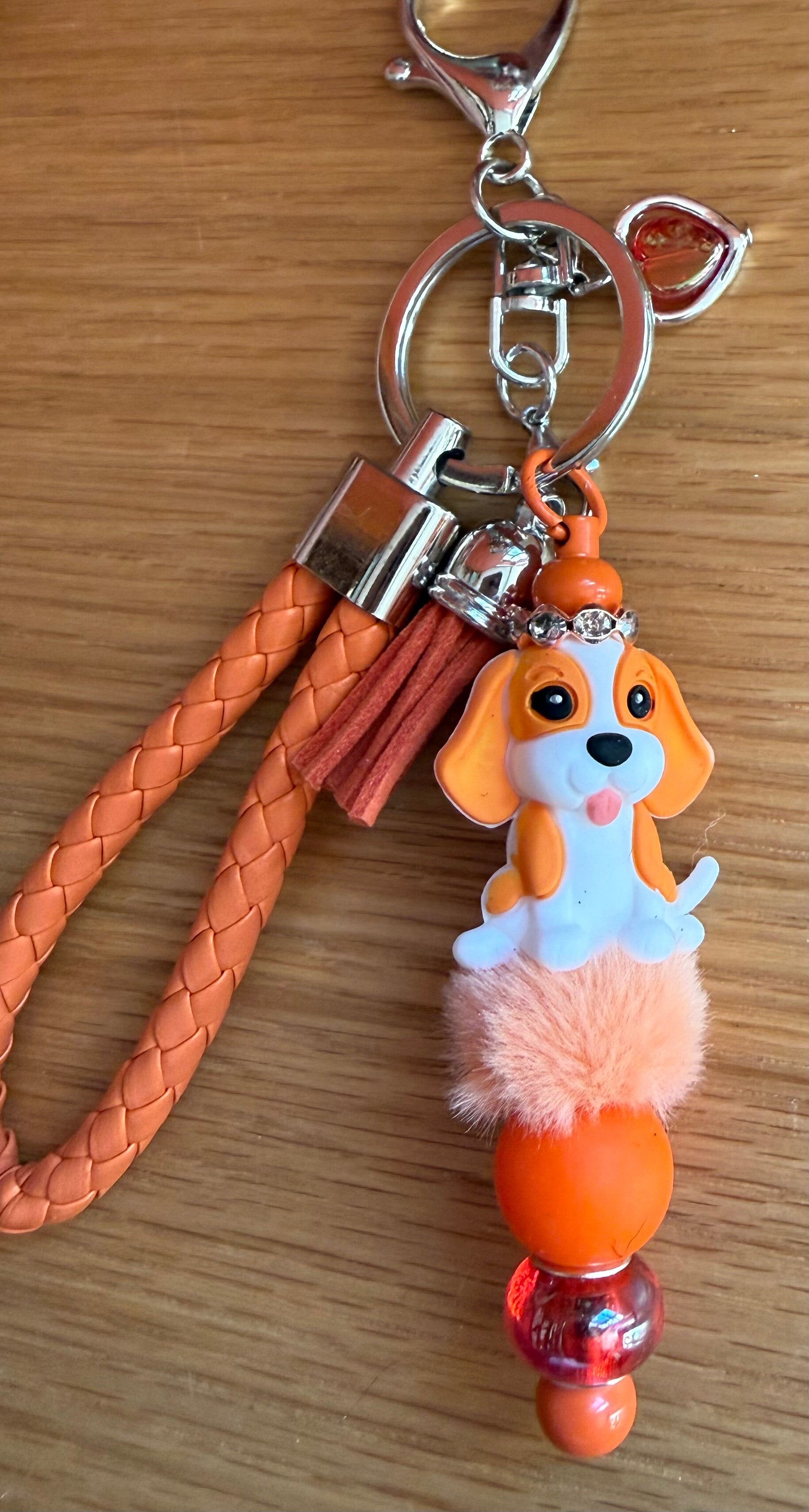 Porte-clé chien orange pétillant