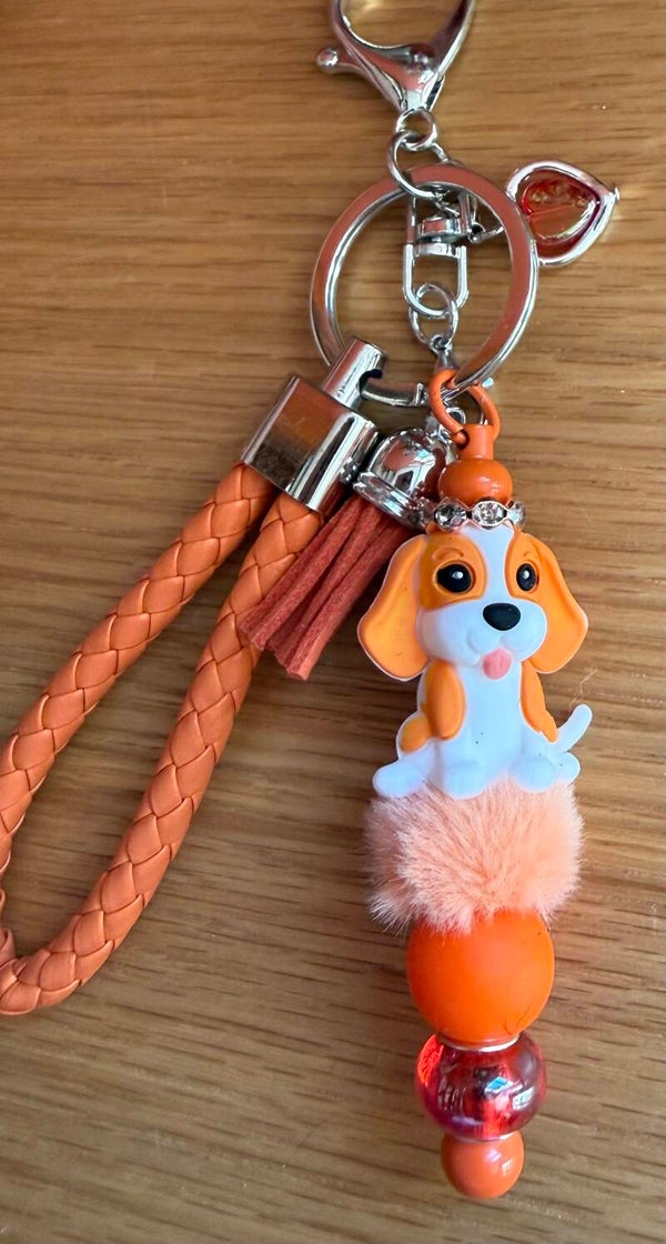 Porte-clé chien orange pétillant