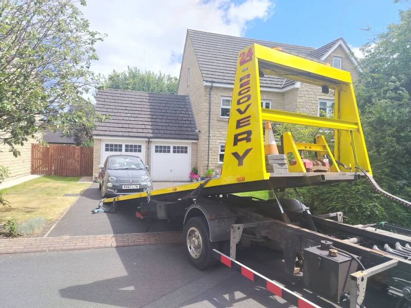 SLK Recovery Vehicle REcovering a Vehicle from a Home Address.