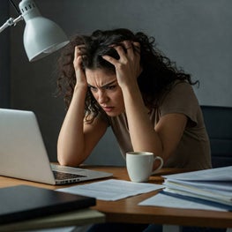Annoyed lady in home office