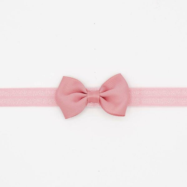 Haarbandje lichtroze strikje