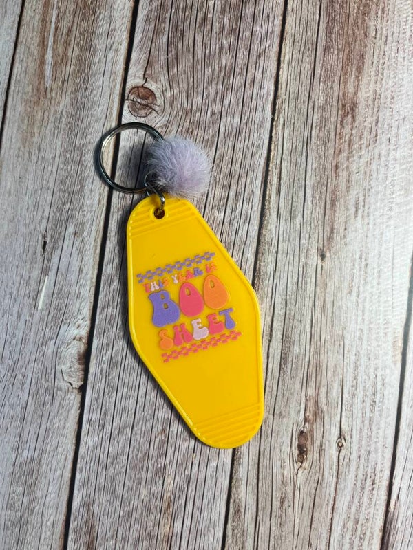 Acrylic hotel keyring with Pom