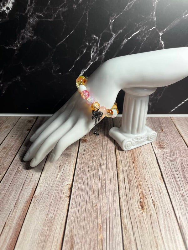 Glass bead stretchy bracelet with metal charm