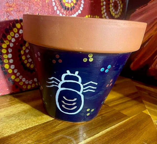 Traditionally painted clay pot