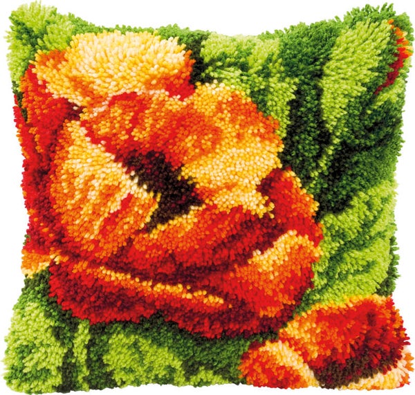 Knooppakket kussen oranje bloem