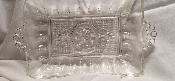 V- Schaaltje met bloemmotief en druppels