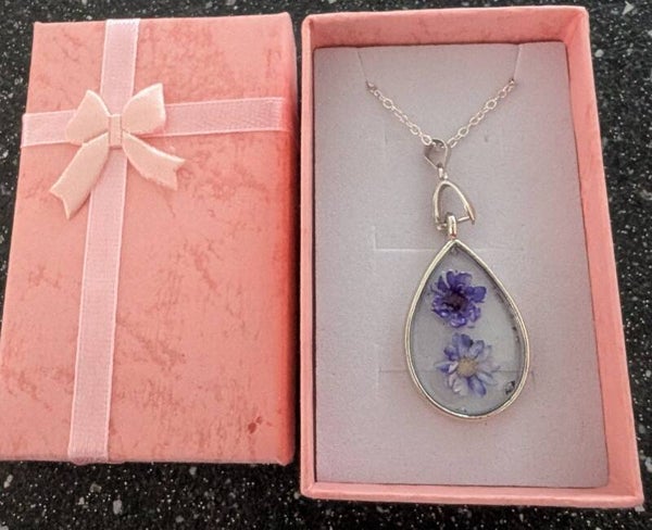 Tear drop resin pendant with dried flowers