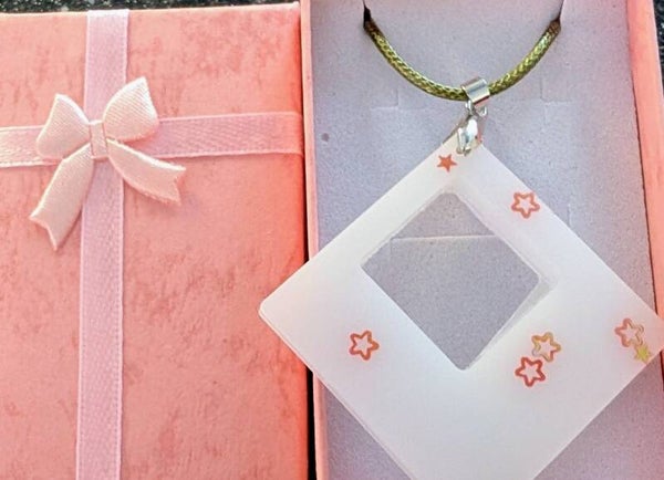Diamond shape White resin pendant on a rope necklace with Glitter gold stars