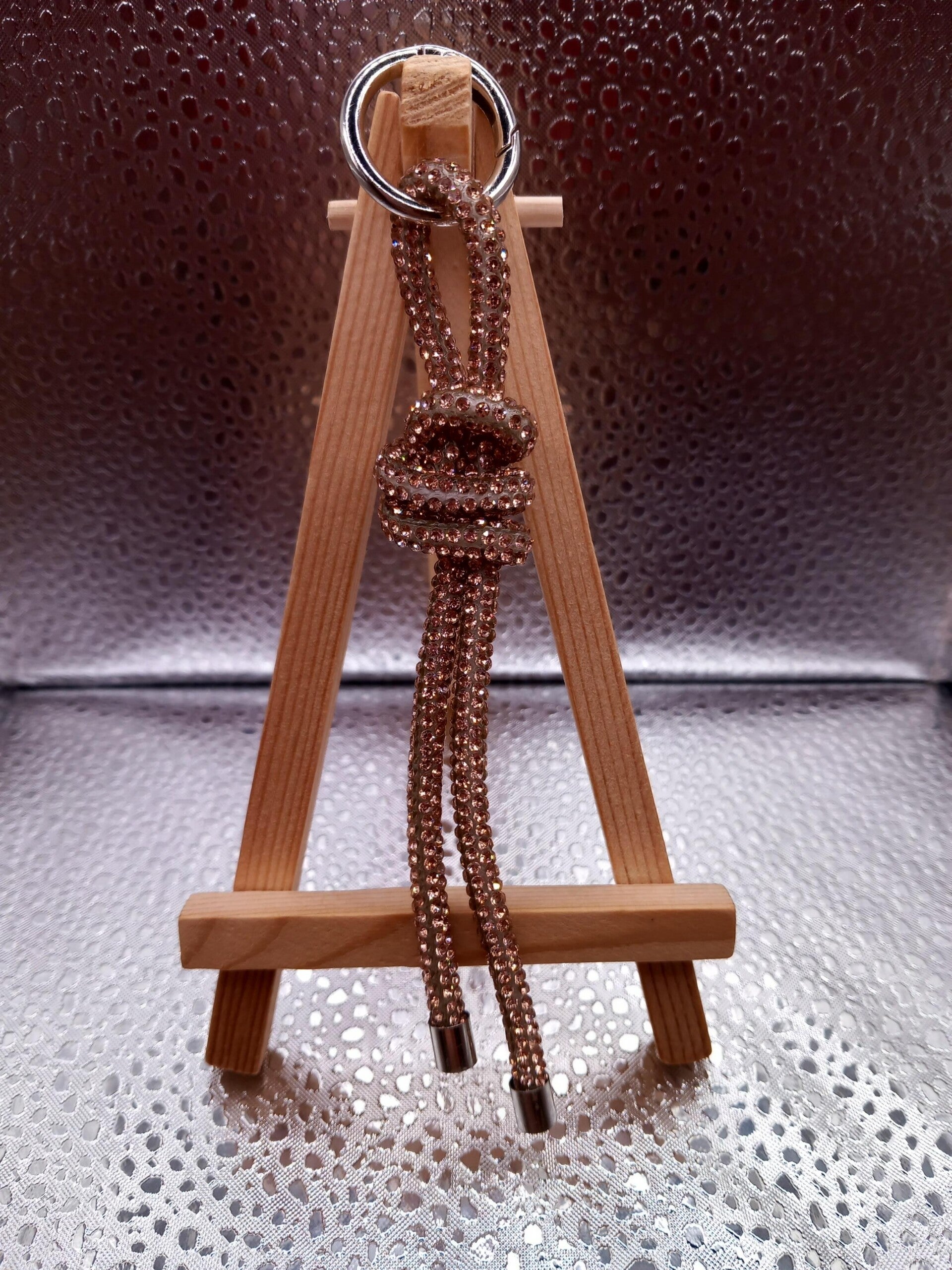 Telefoonkoord knoop champagne