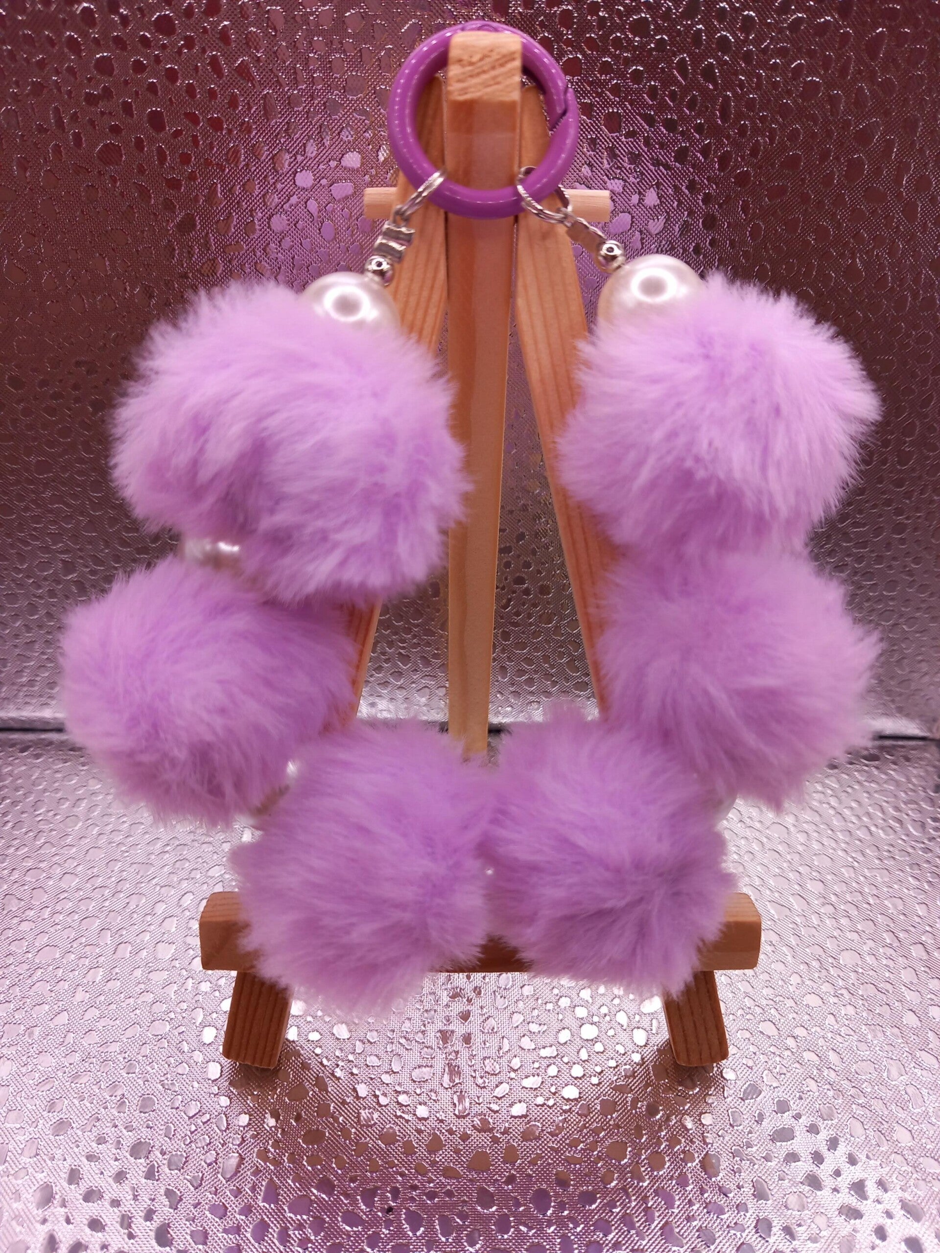 Fluffy bont/parel telefoonkoord lila